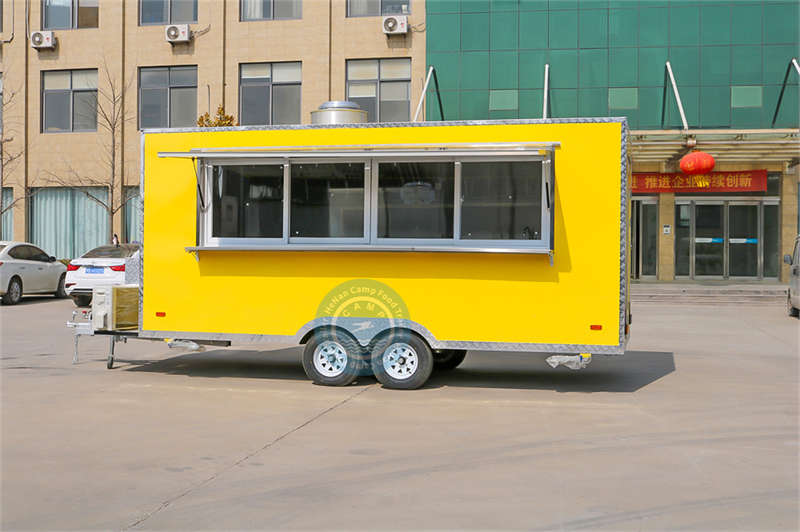 yellow food trailer